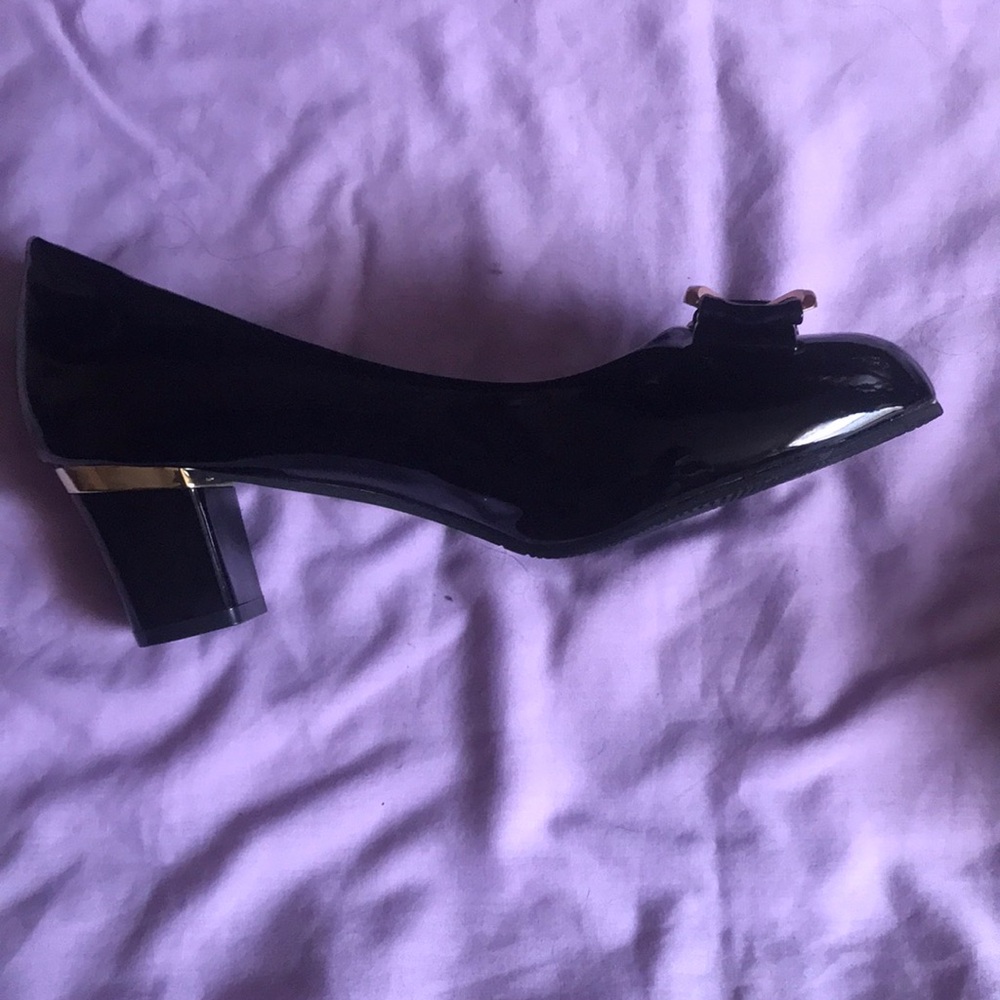 Gold and Black Block Heel Pumps with Decorative Bow